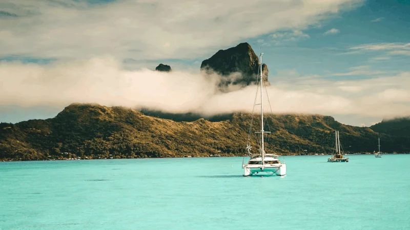Image description: Boat sailing in Bora Bora.