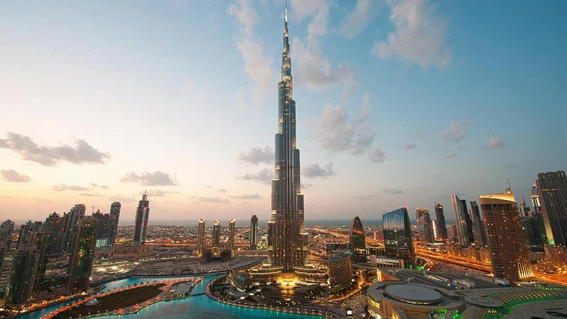 Image Description: City lights in Dubai at sunset