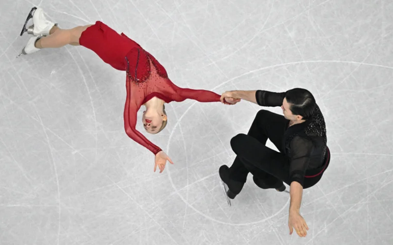 Germany’s Minerva Fabienne Hase and Nikita Volodin compete in the pair skating short program