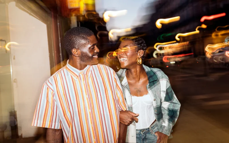 A couple on a date shares a joyful moment