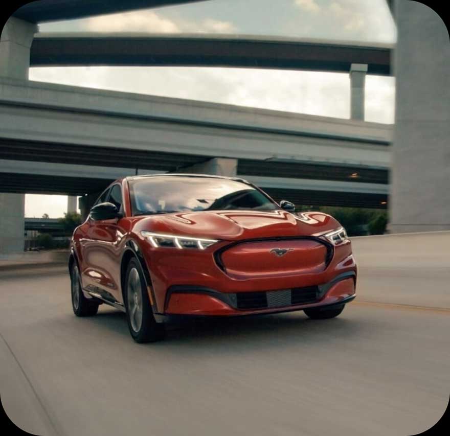 A 2023 Ford Mustang Mach‑E in motion.
