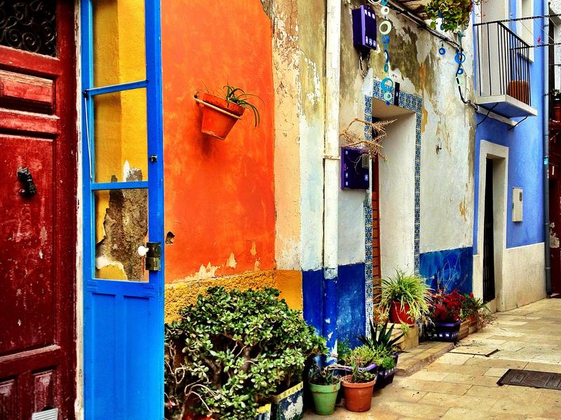 Narrow paved street in Santa Cruz barrio, Alicante, Spain