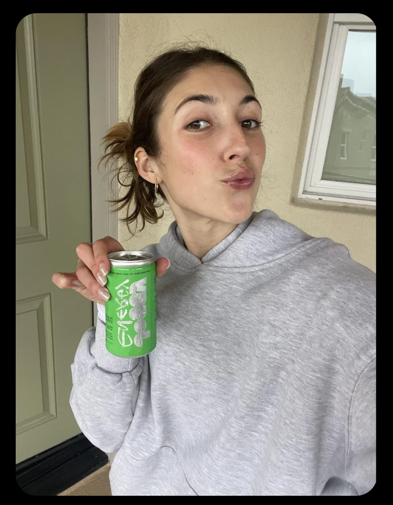 Marla holding a Joggy Energy can
