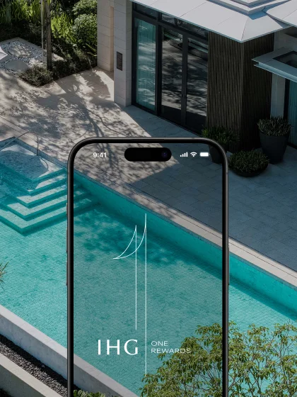 An aerial view of a private swimming pool with a cell phone overlay.