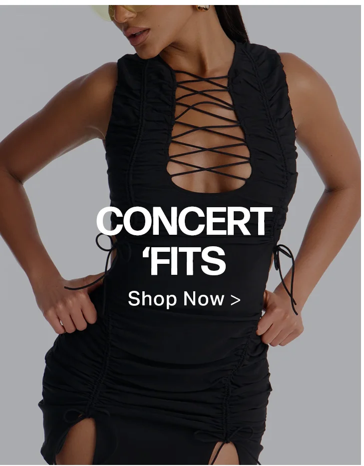 Black ruched lace-up mini dress on model. Shop trendy concert outfits & dresses now in our 'Concert Fits' collection for women.
