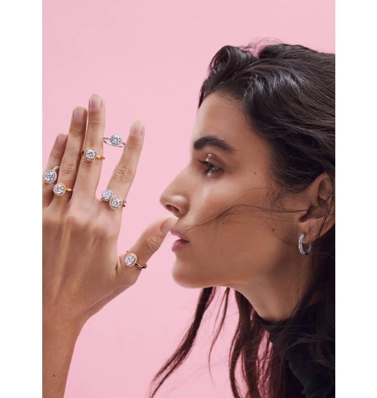 Model wearing Pandora Timeless rings