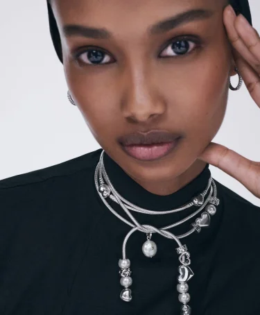 Model wearing Pandora jewelry