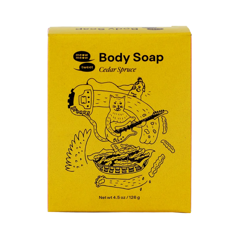 A yellow paper box with a soap bar inside.