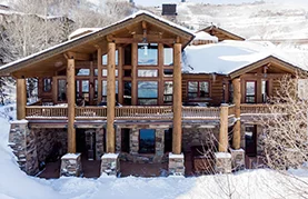 Warm up in a private lodge with a spacious porch and après-ski vibes in Utah.