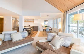 Wake to panoramic peaks in a private chalet built for alpine living in British Columbia.