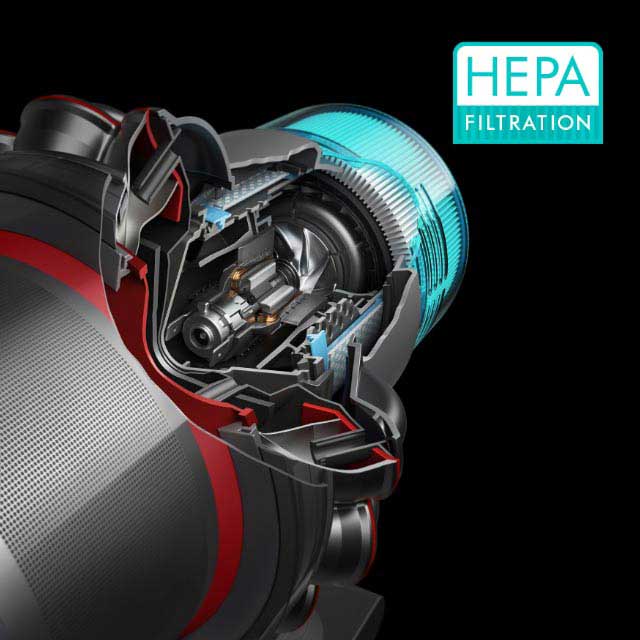 Dyson cordless vacuum in use, with captured pollutants shown