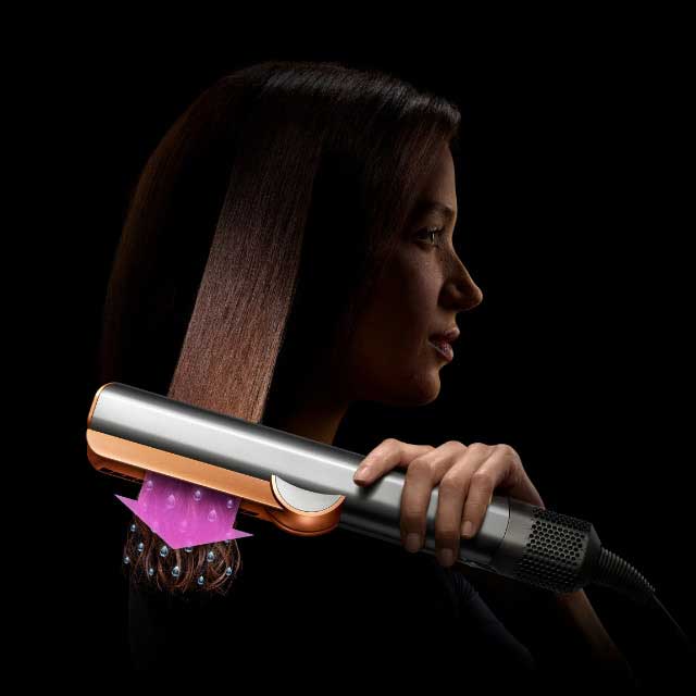 Dyson Airstrait straightener with zoomed in view of its filter