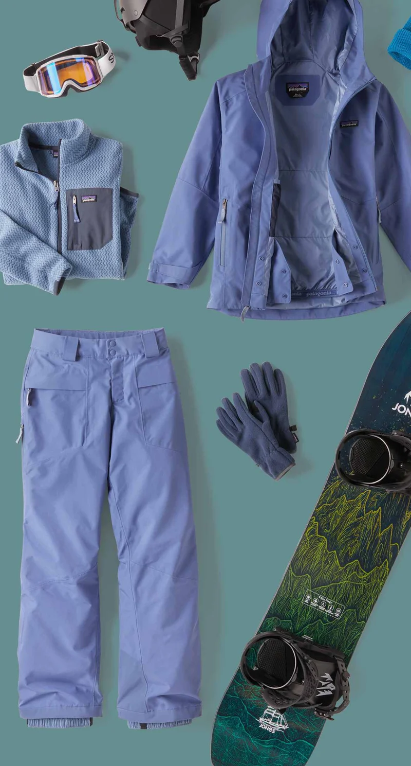 An assortment of kids’ snow clothing and gear.