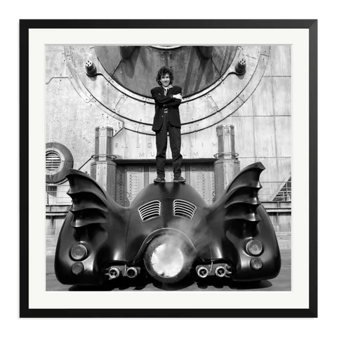Tim Burton on The Batmobile Framed Print