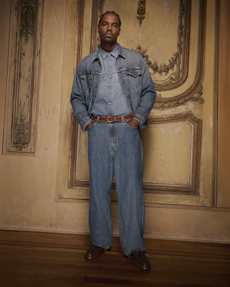 Person wearing medium wash denim on denim