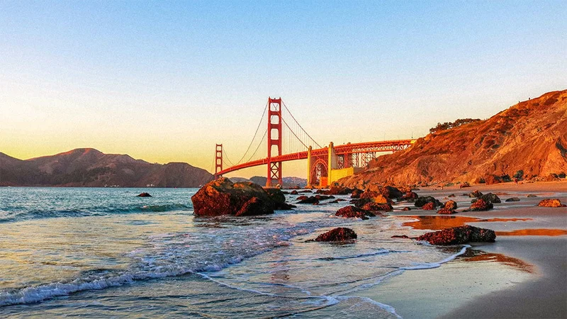 Image description: The beach and Golden Gate Bridge in San Francisco, California