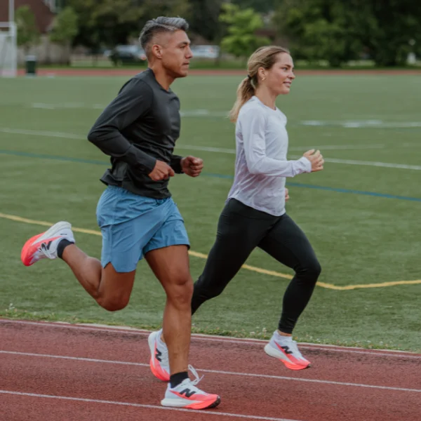 Runners wearing New Balance shoes and apparel
