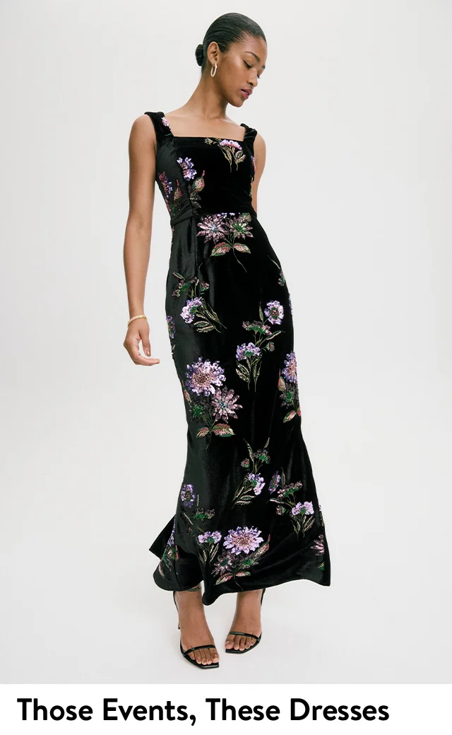 A woman wearing a floral-print dress.