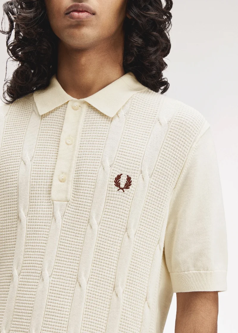 White male model wearing a Fred Perry Textured Cable Knit Shirt in Ecru