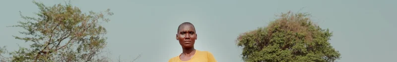 A video cover image of Loveness holding a jerry can in Chamanga