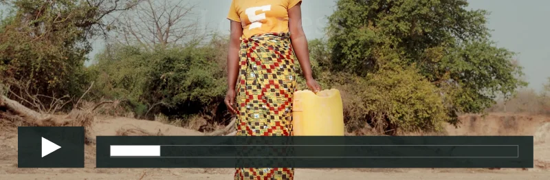 A video cover image of Loveness holding a jerry can in Chamanga