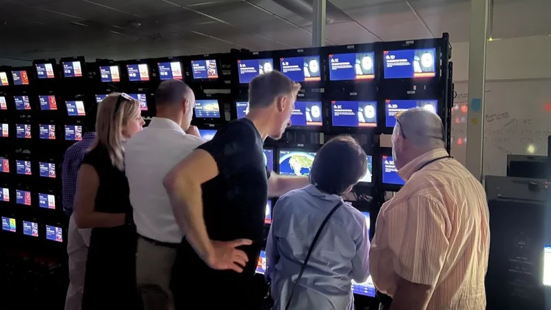 Members of the Advisory Board on Disability test Delta's new flight map in the In-Flight Entertainment lab.