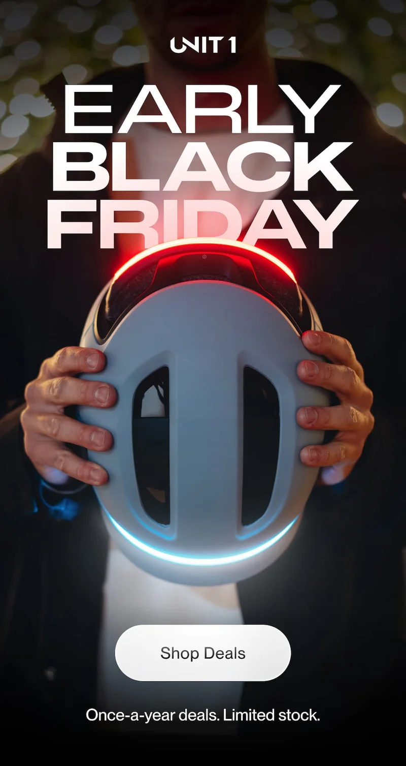 UNIT 1 Smart Helmet glowing in red and blue with Early Black Friday message.