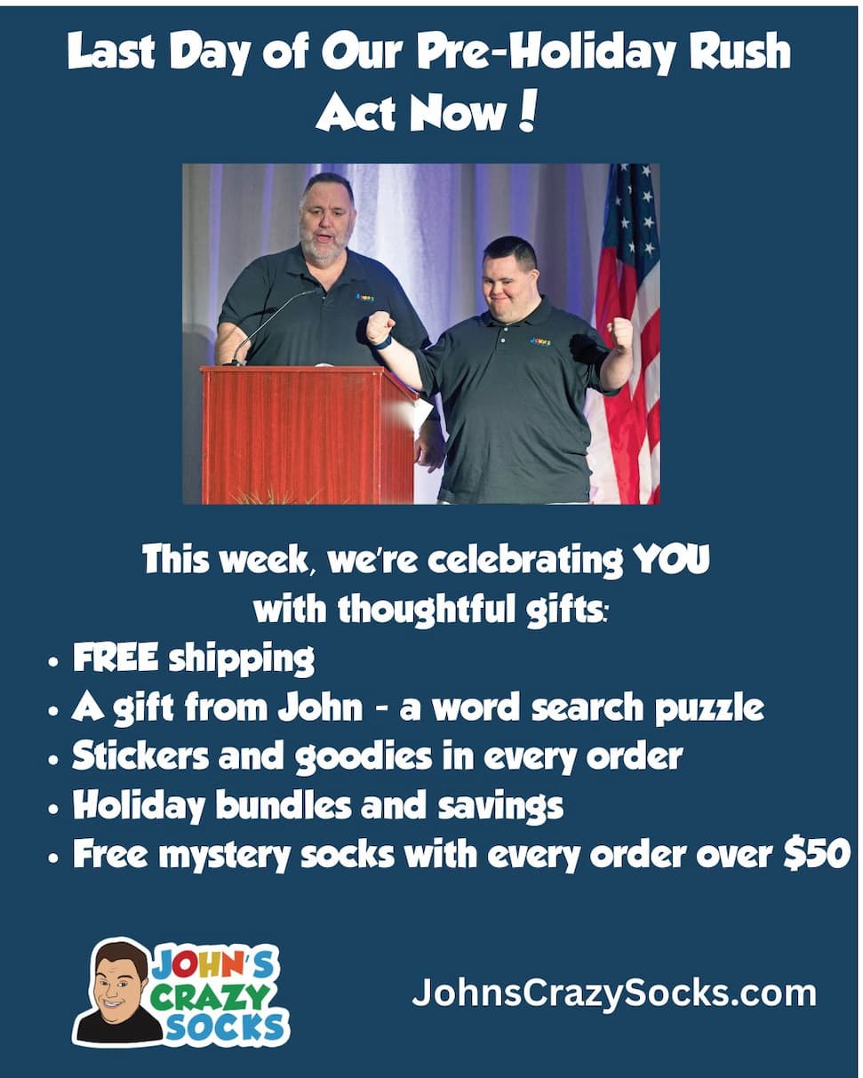 a poster with a picture of John and Mark reminding folks that they get free socks with every order of $50gifts