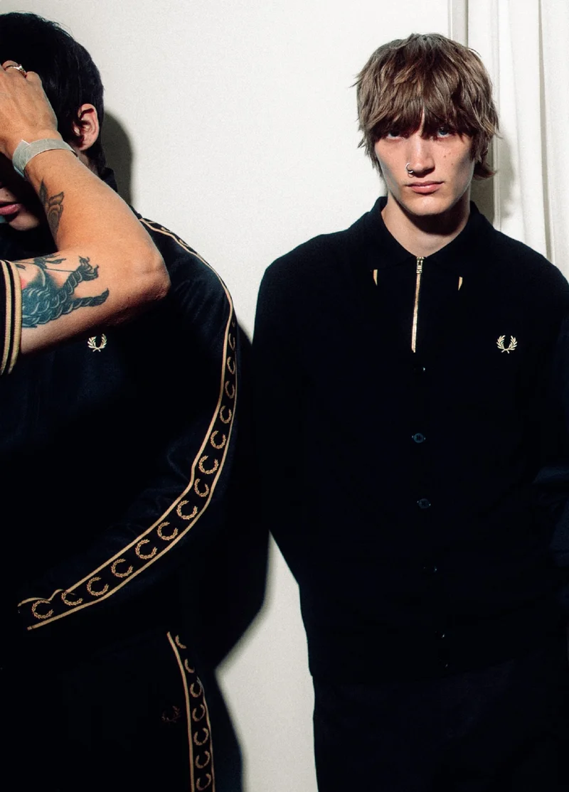 Two male models wearing Fred Perry Black Champagne Track Jackets