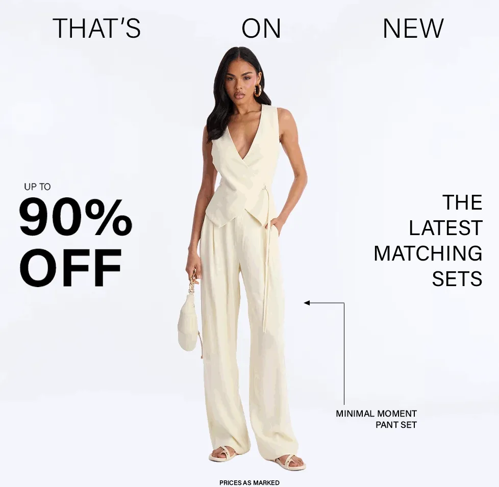 Woman wearing a cream Minimal Moment Pant Set, showcasing new matching sets from the latest collection, now up to 90% off.