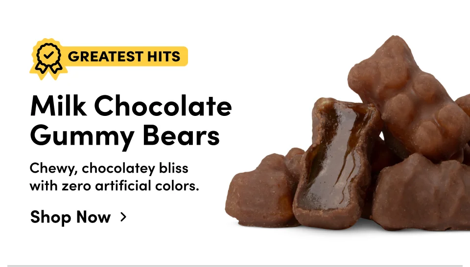 Greatest Hits | Milk chocolate gummy bears. Chewy, chocolatey bliss with zero artificial colors; Shop now>