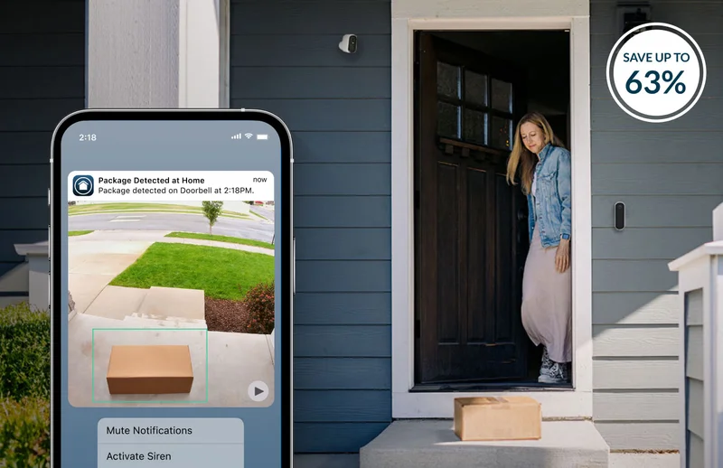 Up to 63% off. Various Arlo security products mounted on the exterior of a home where a person opens the door to retrieve a package. A phone displaying a simulated screen image of an Arlo Secure notification shows a package detection alert.