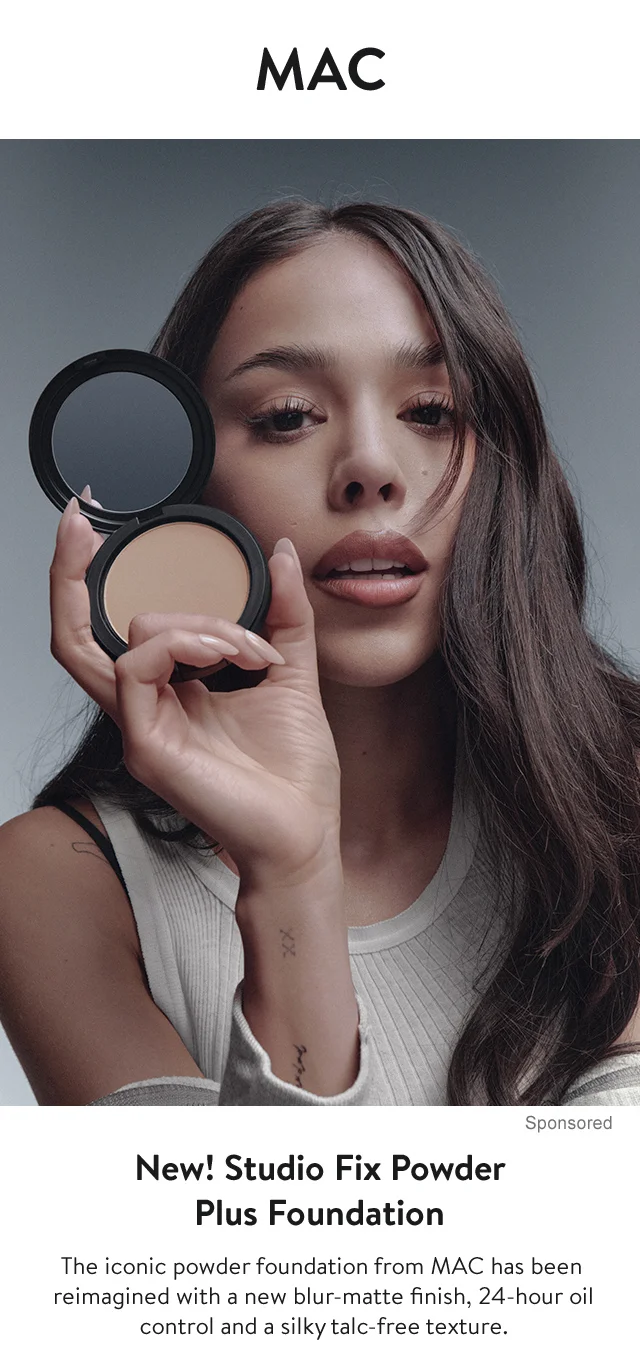 Model holding up MAC compact.