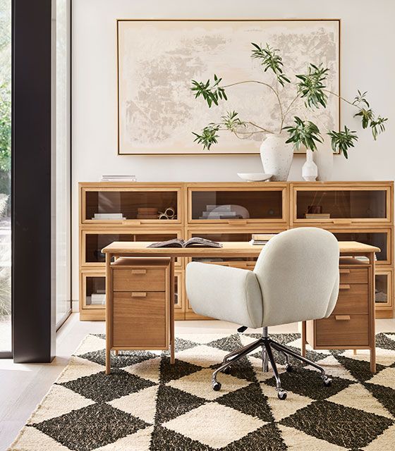 turn up the contrast with bold black rugs