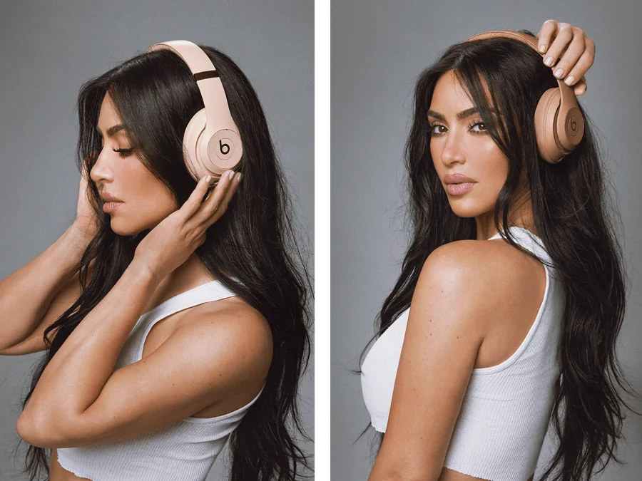 Kim Kardashian wearing Beats Studio Pro headphones in Moon and Dune
