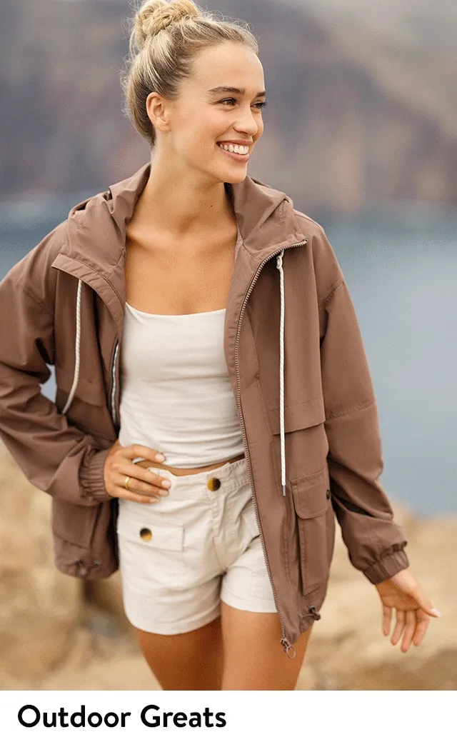 A woman wearing a hooded active jacket. A man wearing a lightweight active jacket.