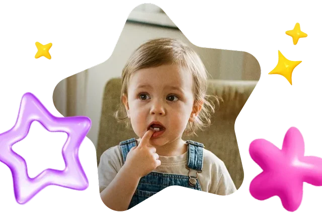 Toddler playing with wiggly tooth