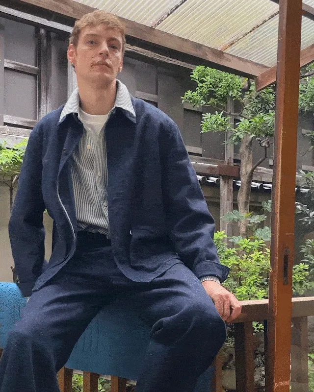 Gif of a person wearing Levi's® Blue Tab™ and posing on a fence