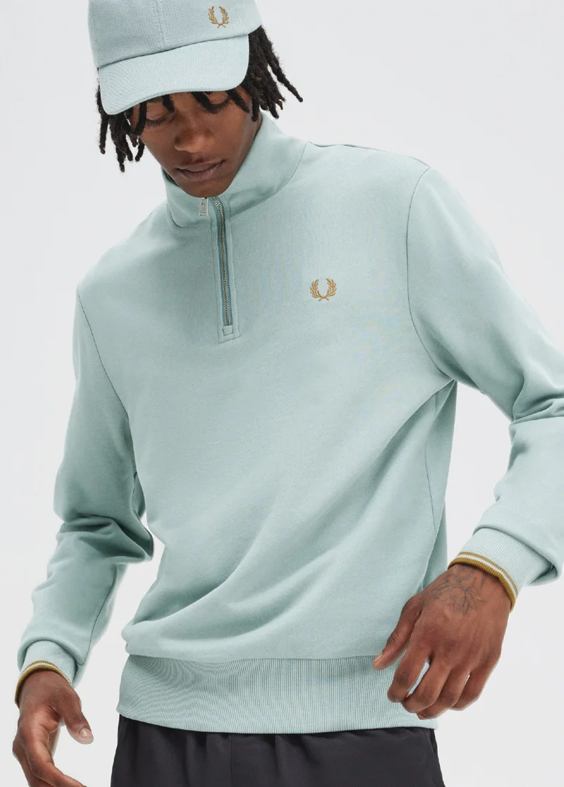 Sweatshirts in the Sale: Male model wears Half-Zip Sweatshirt in Silver Blue