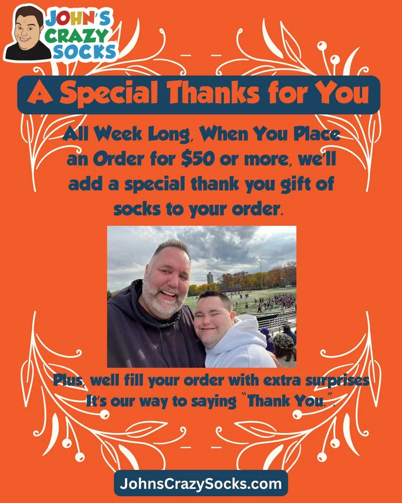a poster with a picture of John and Mark reminding folks that they get free socks with every order of $50gifts