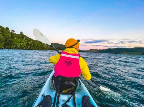Image Description: A person kayaking.