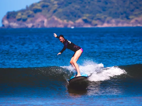 Image Description: A person surfing.