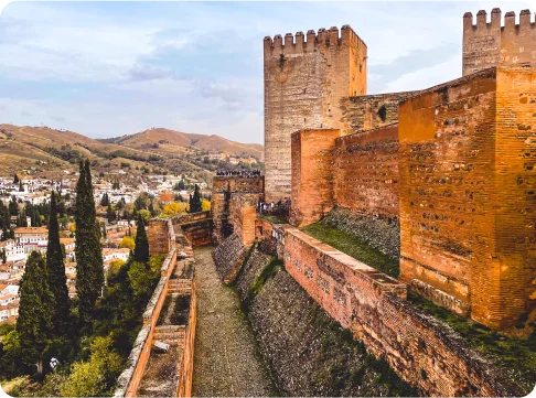 Image Description: An ancient building overlooking a city.