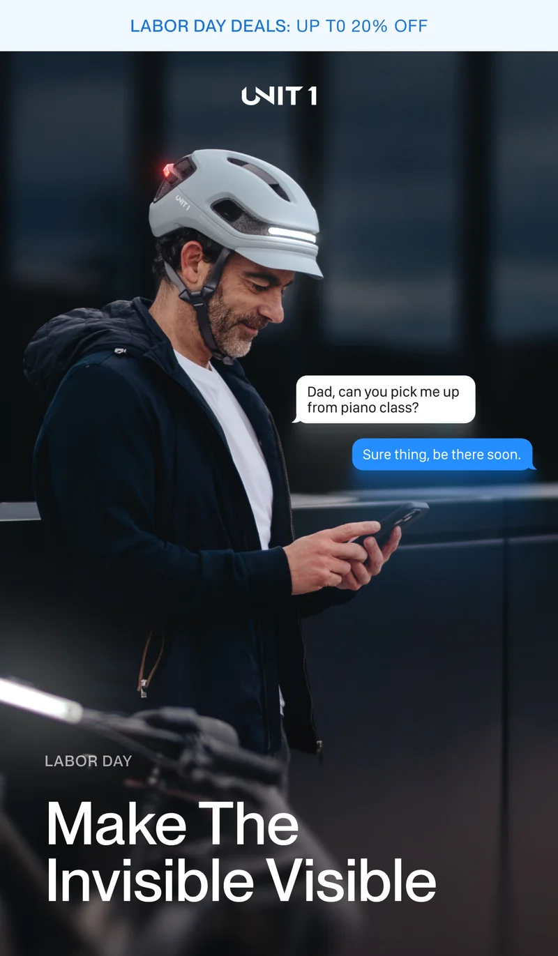 UNIT 1 smart helmet with integrated lights, showing chat messages about daily life. Headline: Make the Invisible Visible – Labor Day campaign.
