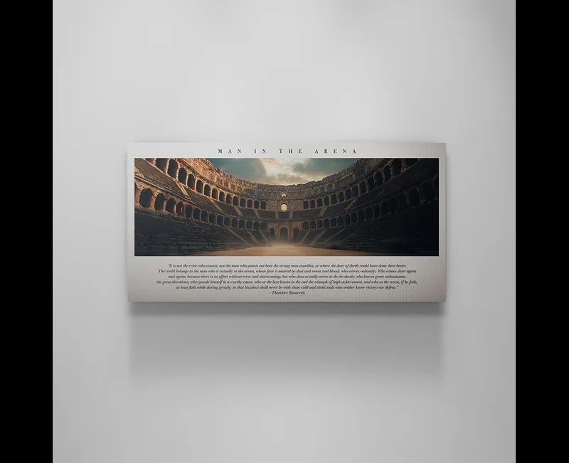Canvas artwork of an ancient colosseum with the title “Man in the Arena” and Theodore Roosevelt’s famous speech excerpt printed below. Canvas artwork of an ancient colosseum with the title “Man in the Arena” and Theodore Roosevelt’s famous speech excerpt printed below.