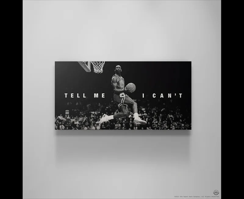 Black and white canvas of Michael Jordan mid-air dunk with the words “Tell Me I Can’t.” Black and white canvas of Michael Jordan mid-air dunk with the words “Tell Me I Can’t.”