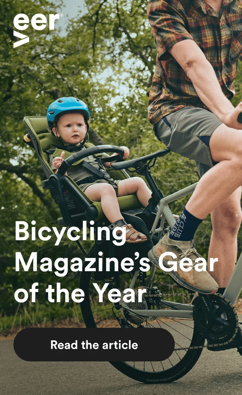 Father and child using the Switch&Bike on a wooded trail