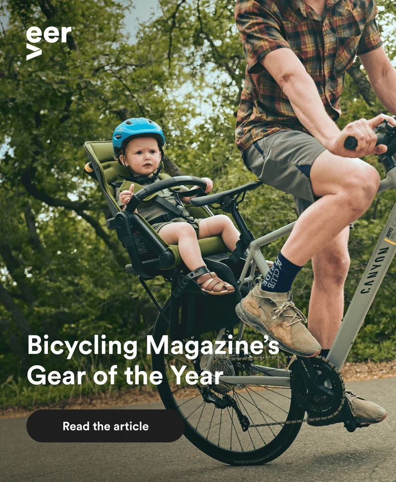 Father and child using the Switch&Bike on a wooded trail
