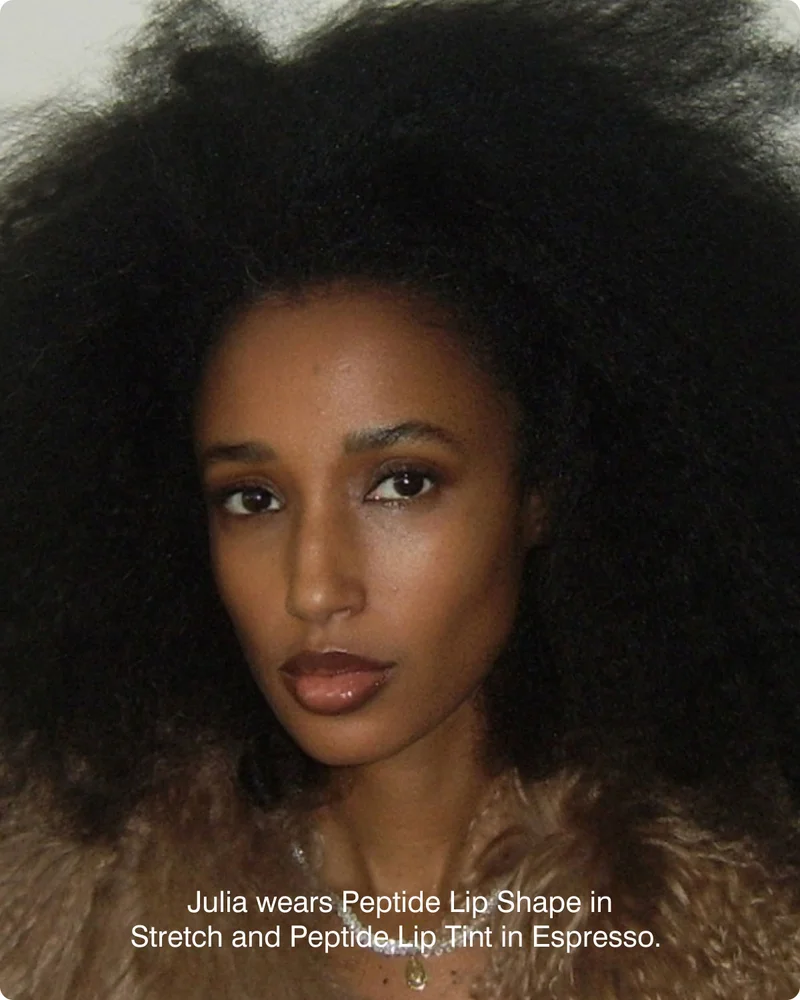 Julia wears Peptide Lip Shape in Stretch and Peptide Lip Tint in Espresso.