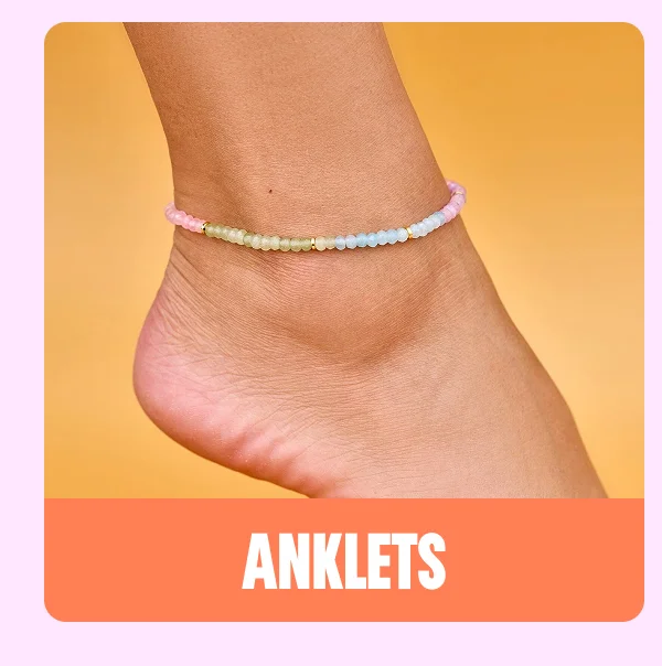 an image of a woman's foot with a bracelet on it